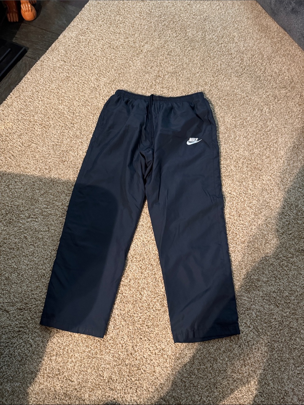 Nike Black Track Pants with White Swoosh Logo